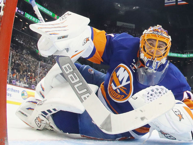 NEW YORK, NY - DECEMBER 04: Jaroslav Halak #41 of the New York Islanders keeps his eyes on the puck during the second period against the Detroit Red Wings at the Barclays Center on December 4, 2016 in the Brooklyn borough of New York City.