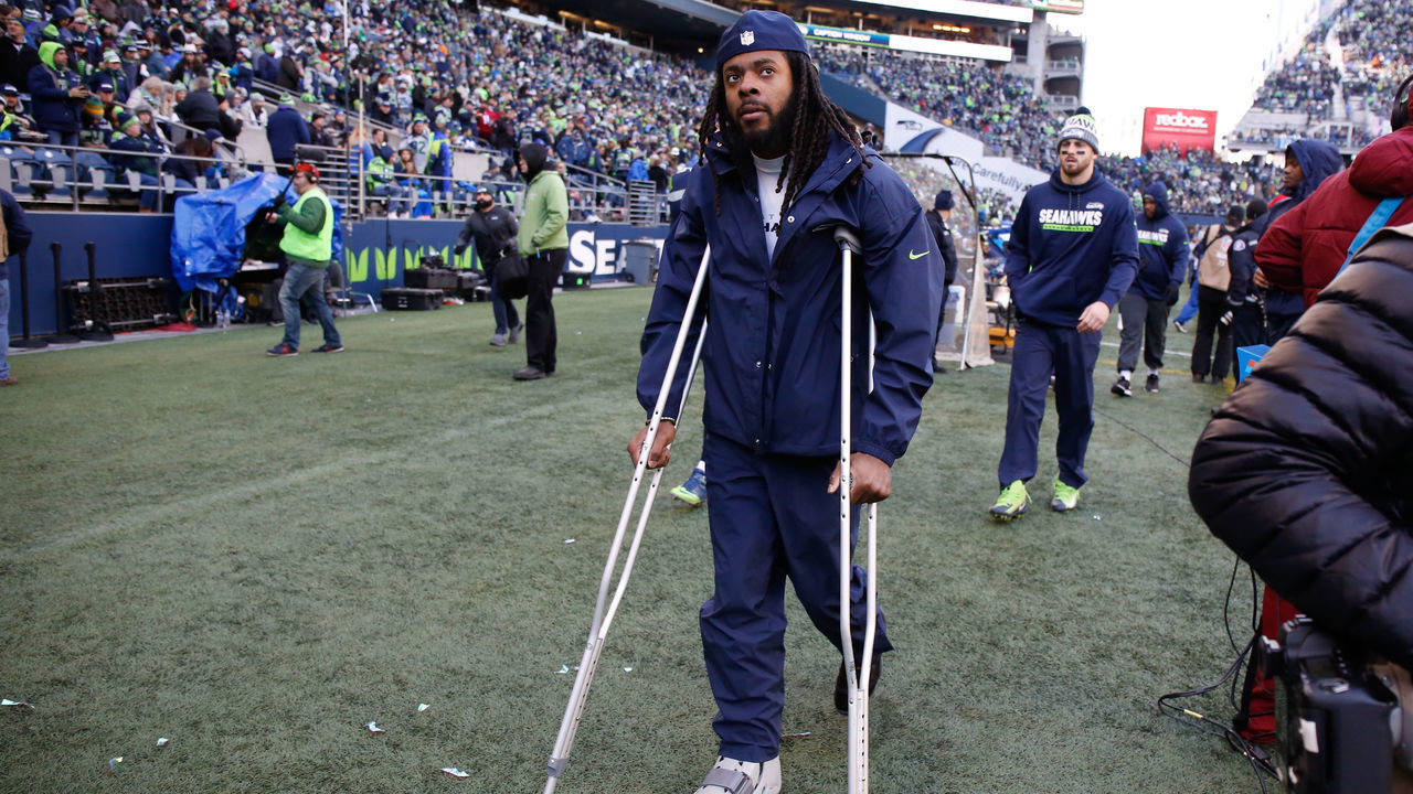 SEATTLE, WA - DECEMBER 31: Cornerback Richard Sherman #25 of the Seattle Seahawks walks on the sidelines in the third quarter against the Arizona Cardinals at CenturyLink Field on December 31, 2017 in Seattle, Washington.