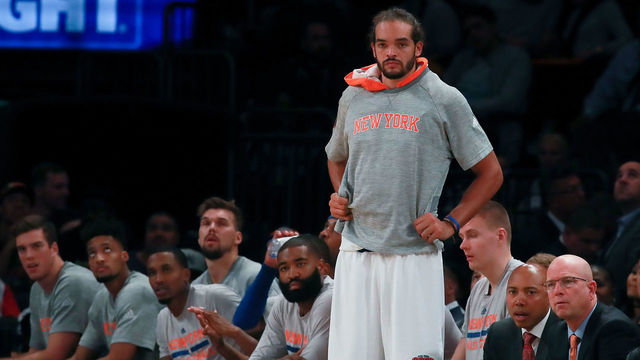 NEW YORK, NY - OCTOBER 15: Joakim Noah #13 of the New York Knicks looks on from the bench against the Boston Celtics during the second half of their preseason game at Madison Square Garden on October 15, 2016 in New York City.