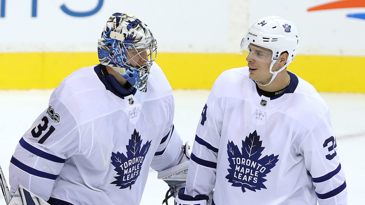 WINNIPEG, MB - OCTOBER 4: Forward Auston Matthews #34 and goaltender Frederik Andersen #31 of the Toronto Maple Leafs leaves the ice after defeating the Winnipeg Jets in NHL action on October 4, 2017 at the Bell MTS Place in Winnipeg, Manitoba, Canada.
