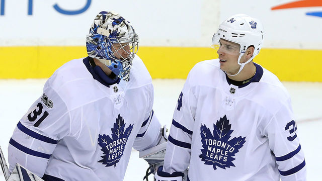 WINNIPEG, MB - OCTOBER 4: Forward Auston Matthews #34 and goaltender Frederik Andersen #31 of the Toronto Maple Leafs leaves the ice after defeating the Winnipeg Jets in NHL action on October 4, 2017 at the Bell MTS Place in Winnipeg, Manitoba, Canada.