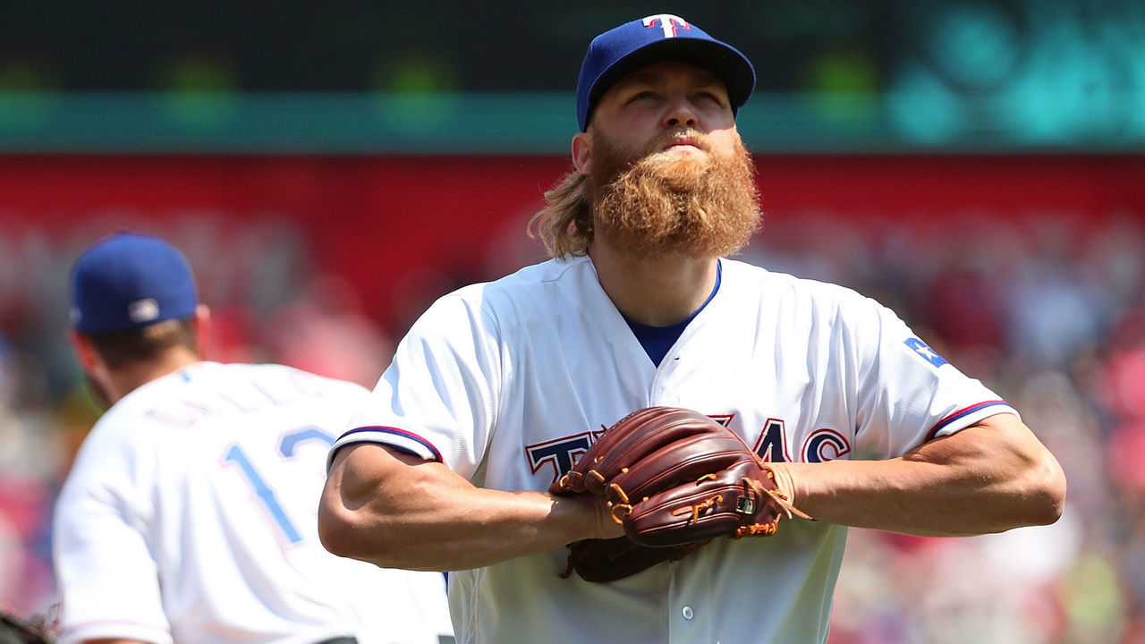 ARLINGTON, TX - SEPTEMBER 09: Andrew Cashner #54 of the Texas Rangers leaves the game in the 8th inning after hitting Todd Frazier of the New York Yankees with a pitch at Globe Life Park in Arlington on September 9, 2017 in Arlington, Texas.