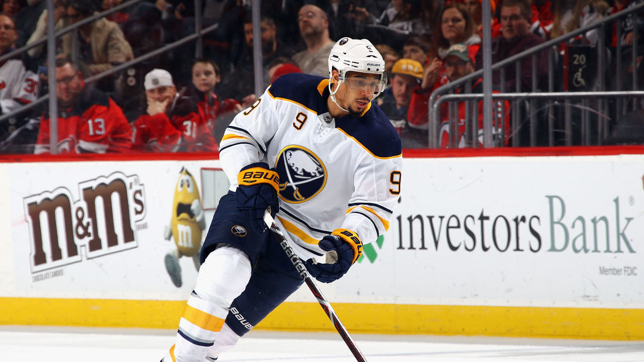 NEWARK, NJ - DECEMBER 29: Evander Kane #9 of the Buffalo Sabres skates against the New Jersey Devils at the Prudential Center on December 29, 2017 in Newark, New Jersey. The Sabres defeated the Devils 4-3 in overtime.
