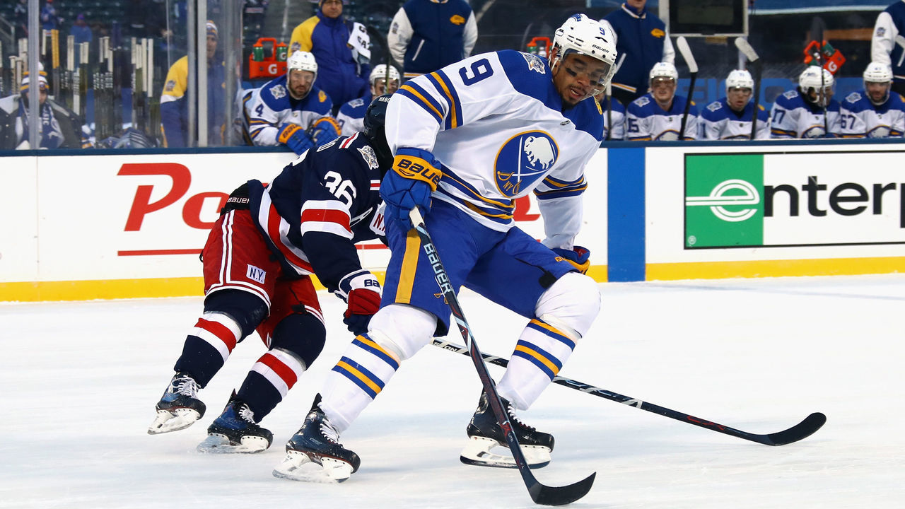 NEW YORK, NY - JANUARY 01: Evander Kane #9 of the Buffalo Sabres skates against the New York Rangers during the 2018 Bridgestone NHL Winter Classic at Citi Field on January 1, 2018 in the Flushing neighborhood of the Queens borough of New York City. The Rangers defeated the Sabres 3-2 in overtime.