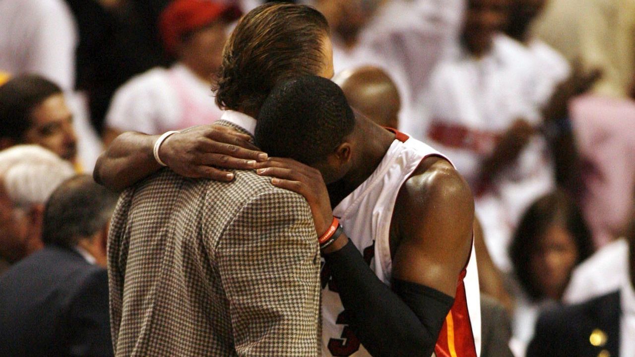 MIAMI - NOVEMBER 7: Guard Dwyane Wade #3 of the Miami Heat hugs Head Coach Pat Riley after defeating the Seattle SuperSonics on November 7, 2006 at the American Airlines Arena in Miami Florida. The Heat defeated the Sonics 90-87. NOTE TO USER: User expressly acknowledges and agrees that, by downloading and/or using this Photograph, User is consenting to the terms and conditions of the Getty Images License Agreement.