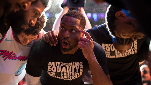MIAMI, FL - FEBRUARY 09: Dwyane Wade #3 of the Miami Heat leads teammates in a huddle before the game against the Milwaukee Bucks at American Airlines Arena on February 9, 2018 in Miami, Florida.