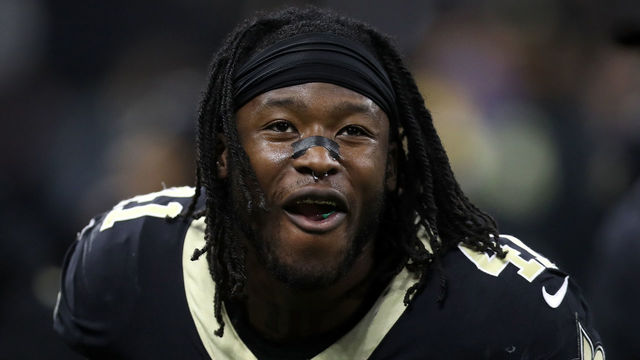 NEW ORLEANS, LA - JANUARY 07: Alvin Kamara #41 of the New Orleans Saints celebrates after a touchdown by eating Airheads candy on the sideline during the game against the Carolina Panthers at the Mercedes-Benz Superdome on January 7, 2018 in New Orleans, Louisiana.