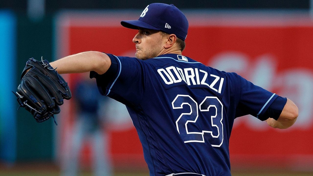 OAKLAND, CA - JULY 17: Jake Odorizzi #23 of the Tampa Bay Rays pitches against the Oakland Athletics during the first inning at the Oakland Coliseum on July 17, 2017 in Oakland, California.