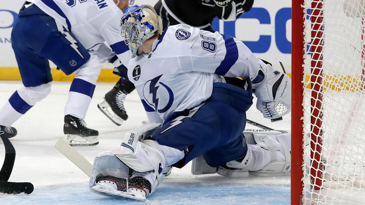 TAMPA, FL - FEBRUARY 10: Andrei Vasilevskiy #88 of the Tampa Bay Lightning makes a behind the back save against the Los Angeles Kings at the Amalie Arena on February 10, 2018 in Tampa, Florida.