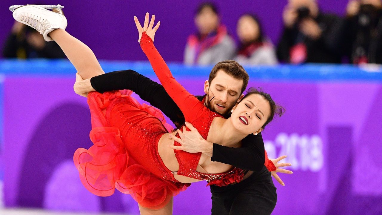 South Korea's Yura Min and South Korea's Alexander Gamelin compete in the figure skating team event ice dance short dance during the Pyeongchang 2018 Winter Olympic Games at the Gangneung Ice Arena in Gangneung on February 11, 2018. / AFP PHOTO / Mladen ANTONOV