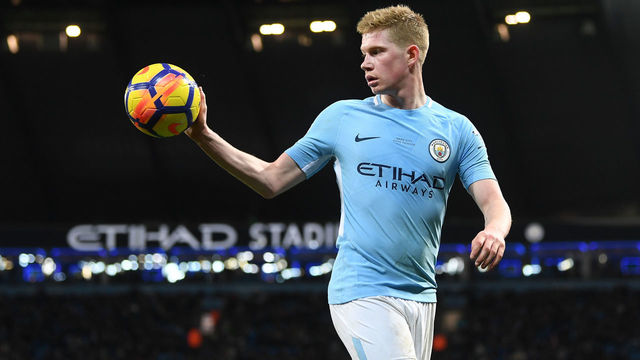 MANCHESTER, ENGLAND - FEBRUARY 10: Kevin De Bruyne of Manchester City retrieves the ball during the Premier League match between Manchester City and Leicester City at Etihad Stadium on February 10, 2018 in Manchester, England.