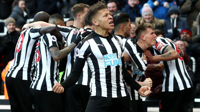 NEWCASTLE UPON TYNE, ENGLAND - FEBRUARY 11: Dwight Gayle of Newcastle United celebrates his sides first goal during the Premier League match between Newcastle United and Manchester United at St. James Park on February 11, 2018 in Newcastle upon Tyne, England.