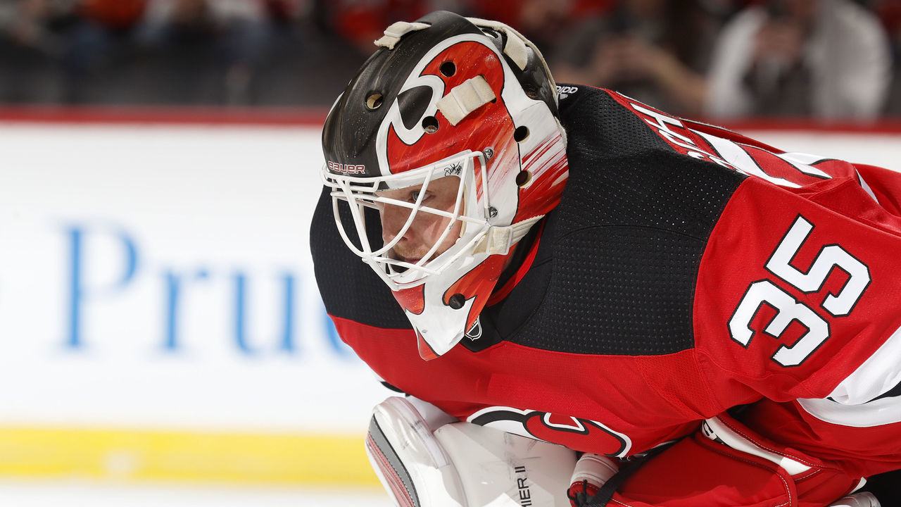 NEWARK, NJ - JANUARY 13: Cory Schneider #35 of the New Jersey Devils during a break in action against the Philadelphia Flyers during the first period at the Prudential Center on January 13, 2018 in Newark, New Jersey.