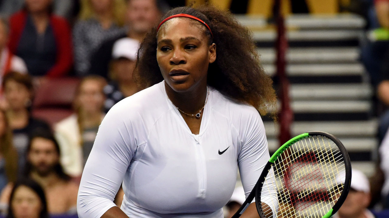 ASHEVILLE, NC - FEBRUARY 11: Serena Williams of Team USA reacts after a shot to Lesley Kerkhove and Demi Schuurs of the Netherlands during a doubles match in the first round of the 2018 Fed Cup at US Cellular Center on February 11, 2018 in Asheville, North Carolina.