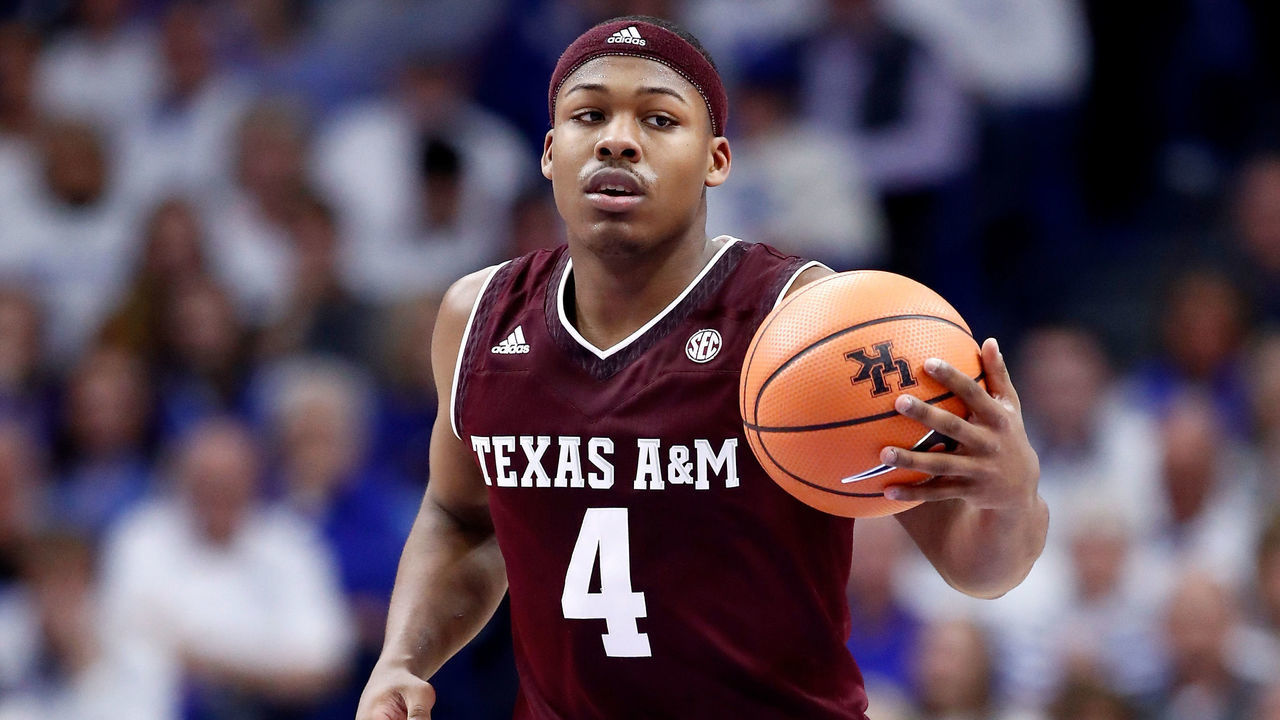LEXINGTON, KY - JANUARY 09: JJ Caldwell #4 of the Texas A&M Aggies dribbles the ball against the Kentucky Wildcats during the game at Rupp Arena on January 9, 2018 in Lexington, Kentucky.