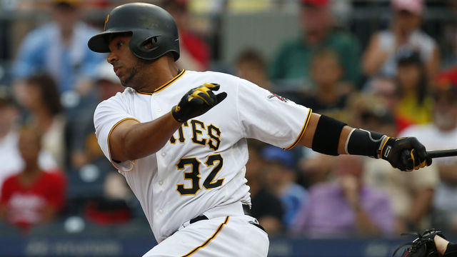 PITTSBURGH, PA - AUGUST 19: Elias Diaz #32 of the Pittsburgh Pirates hits into a double play scoring a run in the second inning against the St. Louis Cardinals at PNC Park on August 19, 2017 in Pittsburgh, Pennsylvania.