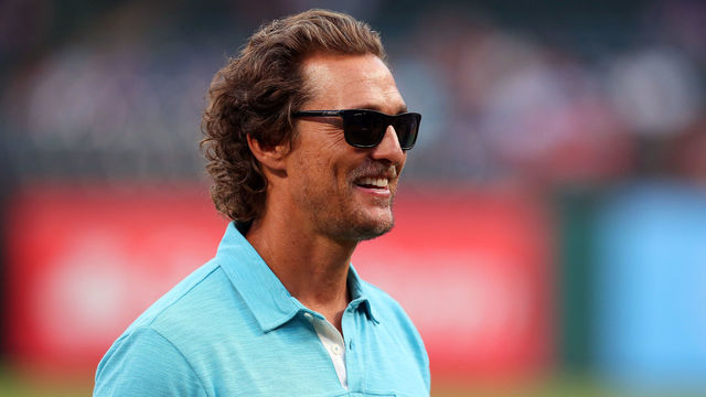 ARLINGTON, TX - SEPTEMBER 13: Actor Matthew McConaughey takes part in pregame activities before the Texas Rangers take on the Seattle Mariners at Globe Life Park in Arlington on September 13, 2017 in Arlington, Texas.