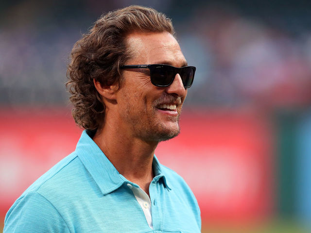 ARLINGTON, TX - SEPTEMBER 13: Actor Matthew McConaughey takes part in pregame activities before the Texas Rangers take on the Seattle Mariners at Globe Life Park in Arlington on September 13, 2017 in Arlington, Texas.