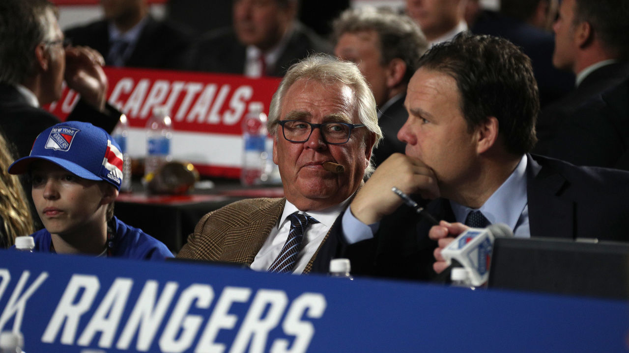 CHICAGO, IL - JUNE 23: President Glen Sather, left, of the New York Rangers looks on from the draft table during Round One of the 2017 NHL Draft at United Center on June 23, 2017 in Chicago, Illinois.