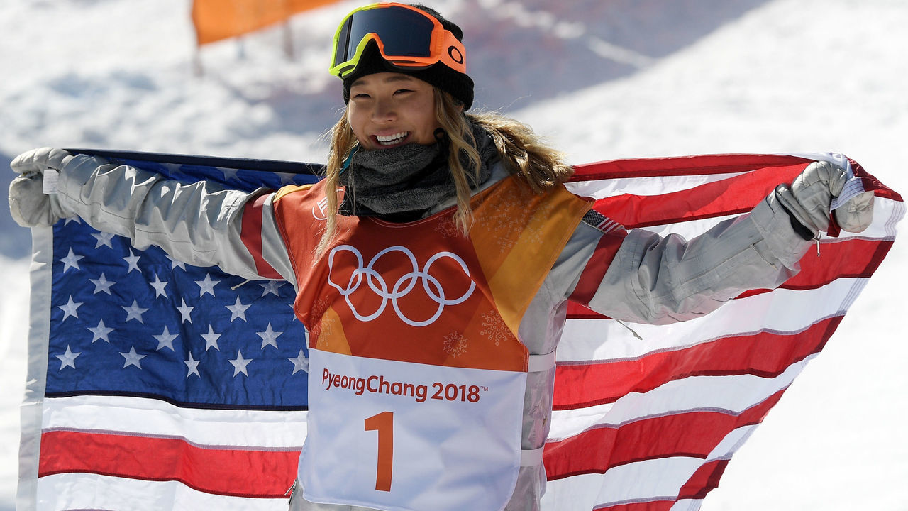 PYEONGCHANG-GUN, SOUTH KOREA - FEBRUARY 13: Gold medalist Chloe Kim of the United States celebrates winning the Snowboard Ladies' Halfpipe Final on day four of the PyeongChang 2018 Winter Olympic Games at Phoenix Snow Park on February 13, 2018 in Pyeongchang-gun, South Korea.
