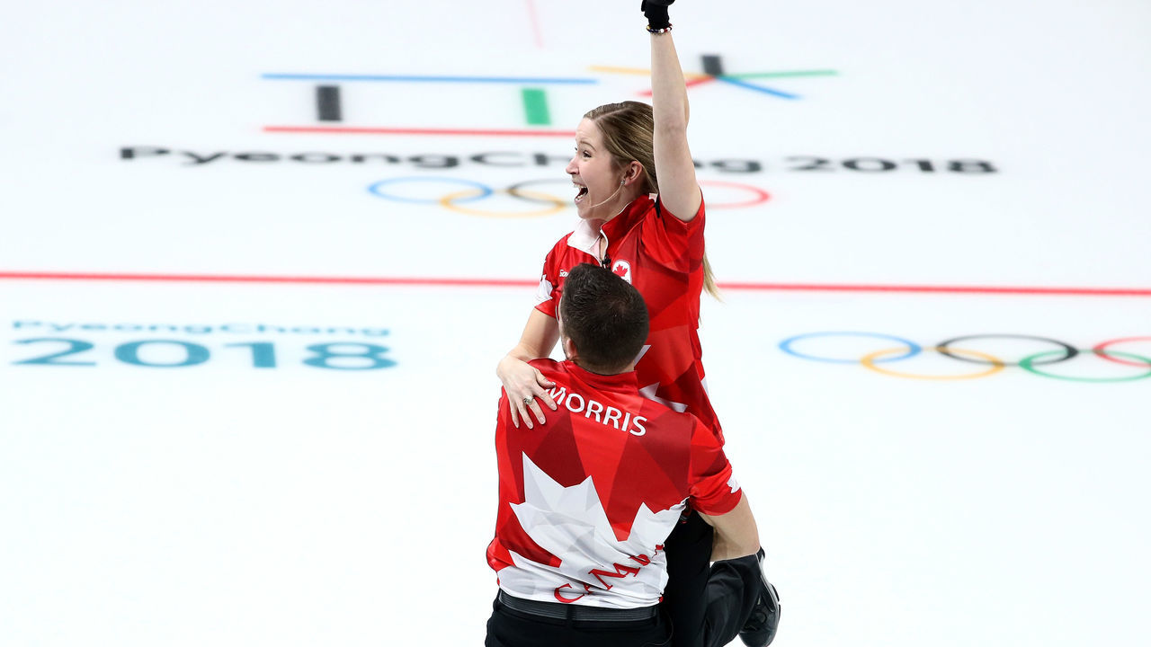 GANGNEUNG, SOUTH KOREA - FEBRUARY 13: John Morris and Kaitlyn Lawes of Canada celebrate defeating Switzerland to win the gold medal during the Curling Mixed Doubles Gold Medal Game on day four of the PyeongChang 2018 Winter Olympic Games at Gangneung Curling Centre on February 13, 2018 in Gangneung, South Korea.