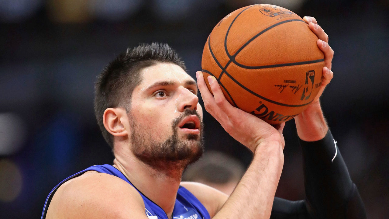 CHICAGO, IL - DECEMBER 20: Nikola Vucevic #9 of the Orlando Magic shoots a free throw against the Chicago Bulls at the United Center on December 20, 2017 in Chicago, Illinois. The Bulls defeated the Magic 112-94.