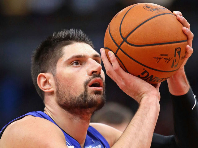 CHICAGO, IL - DECEMBER 20: Nikola Vucevic #9 of the Orlando Magic shoots a free throw against the Chicago Bulls at the United Center on December 20, 2017 in Chicago, Illinois. The Bulls defeated the Magic 112-94.