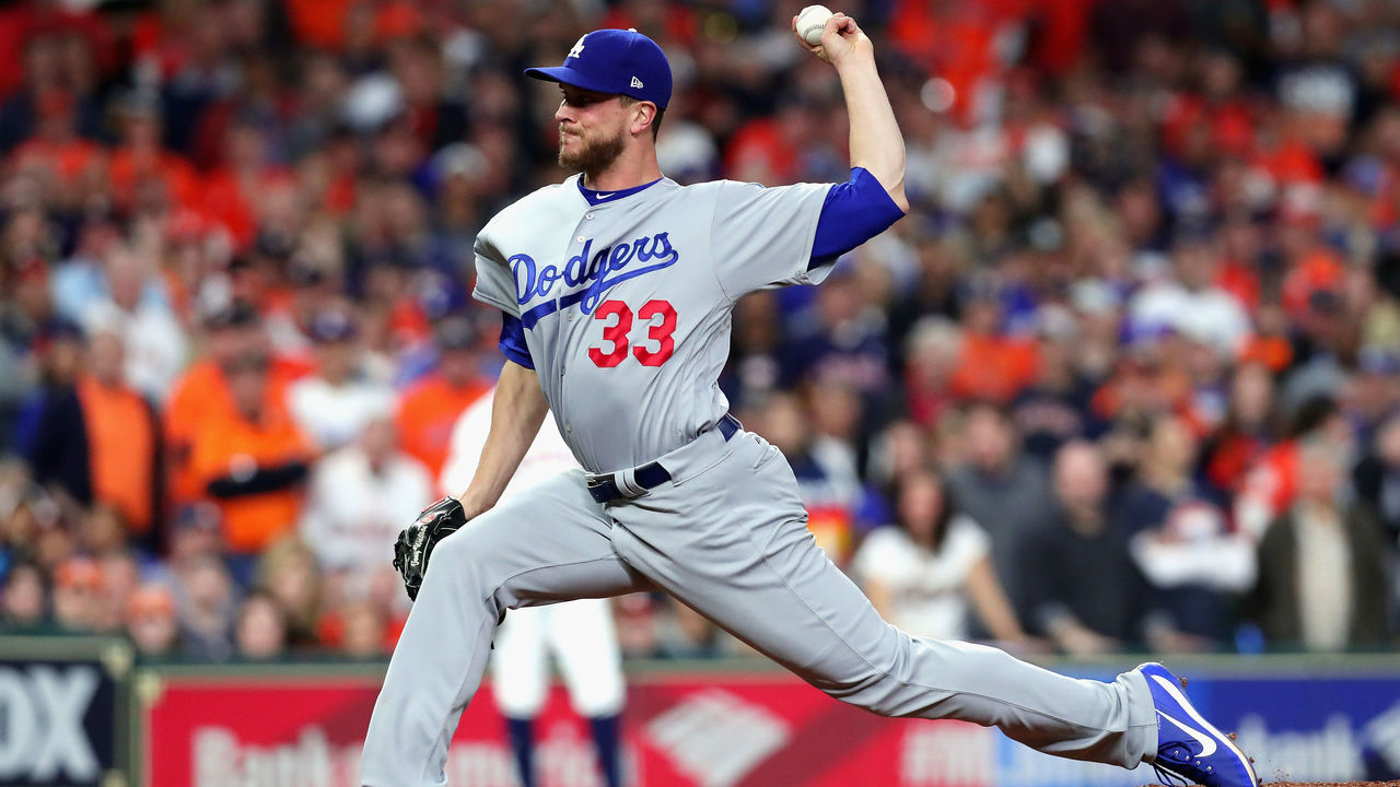 HOUSTON, TX - OCTOBER 28: Tony Watson #33 of the Los Angeles Dodgers throws a pitch during the eighth inning against the Houston Astros in game four of the 2017 World Series at Minute Maid Park on October 28, 2017 in Houston, Texas.