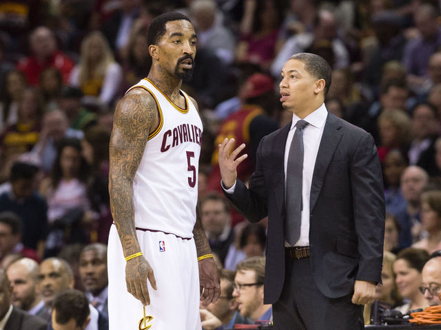 CLEVELAND, OH - MARCH 7: J.R. Smith #5 of the Cleveland Cavaliers talks to head coach Tyronn Lue during the first half at Quicken Loans Arena on March 7, 2016 in Cleveland, Ohio. NOTE TO USER: User expressly acknowledges and agrees that, by downloading and/or using this photograph, user is consenting to the terms and conditions of the Getty Images License Agreement. Mandatory copyright notice.