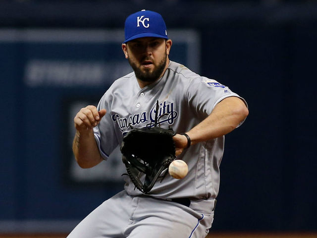 ST. PETERSBURG, FL - MAY 10: Third baseman Mike Moustakas #8 of the Kansas City Royals fields a ball that went for a single off the bat of Brad Miller of the Tampa Bay Rays during the eighth inning of a game on May 10, 2017 at Tropicana Field in St. Petersburg, Florida.