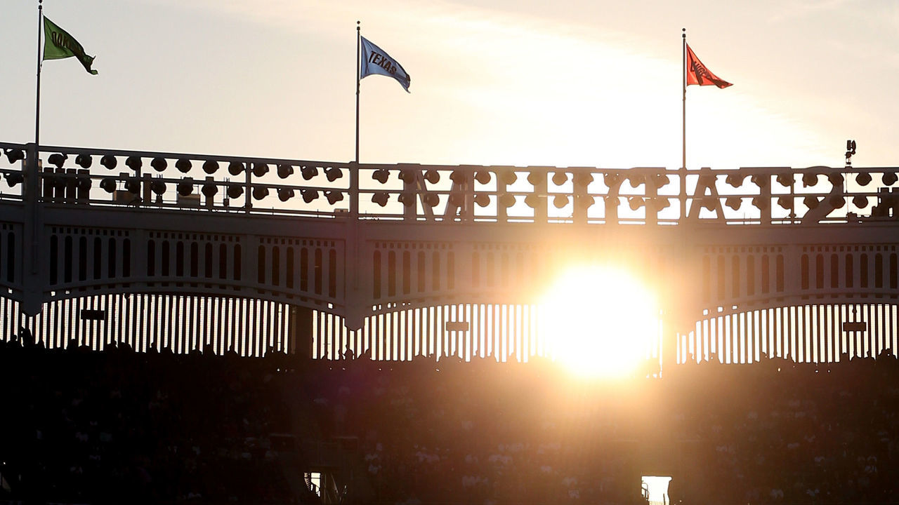 NEW YORK, NY - OCTOBER 14: A detail of the sun shinning through the facade atop the stadium as the led board reads 'Legends are born in October' while the New York Yankees host the Detroit Tigers during Game Two of the American League Championship Series at Yankee Stadium on October 14, 2012 in the Bronx borough of New York City.
