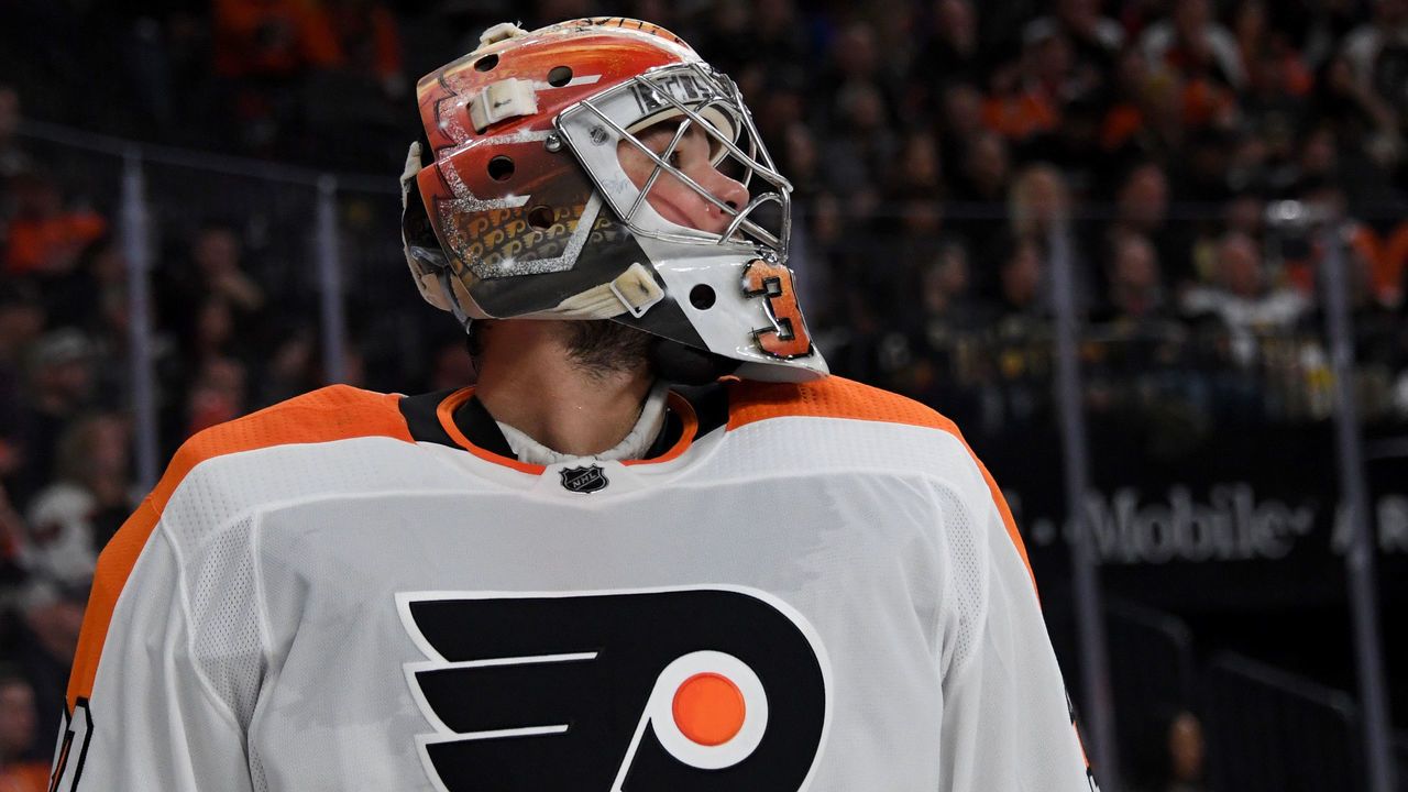 LAS VEGAS, NV - FEBRUARY 11: Michal Neuvirth #30 of the Philadelphia Flyers takes a break during a stop in play in the second period of a game against the Vegas Golden Knights at T-Mobile Arena on February 11, 2018 in Las Vegas, Nevada. The Flyers won 4-1.