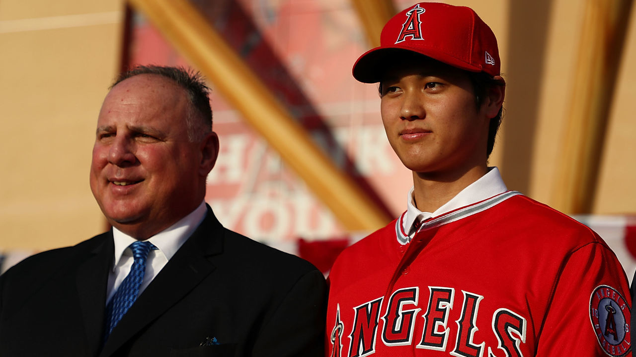 ANAHEIM, CA - DECEMBER 09: Manager Mike Scioscia and Shohei Ohtani pose for a photo during the Shohei Ohtani introduction to the Los Angeles Angels of Anaheim at Angel Stadium of Anaheim on December 9, 2017 in Anaheim, California.