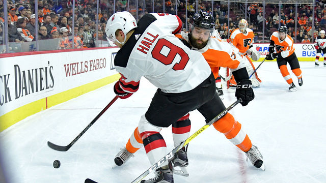 Watch: Devils' Hall slammed into boards after scoring from crazy angle