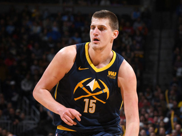 DENVER, CO - FEBRUARY 13: Nikola Jokic #15 of the Denver Nuggets handles the ball against the San Antonio Spurs on February 13, 2018 at the Pepsi Center in Denver, Colorado. NOTE TO USER: User expressly acknowledges and agrees that, by downloading and/or using this photograph, user is consenting to the terms and conditions of the Getty Images License Agreement. Mandatory Copyright Notice: Copyright 2018 NBAE