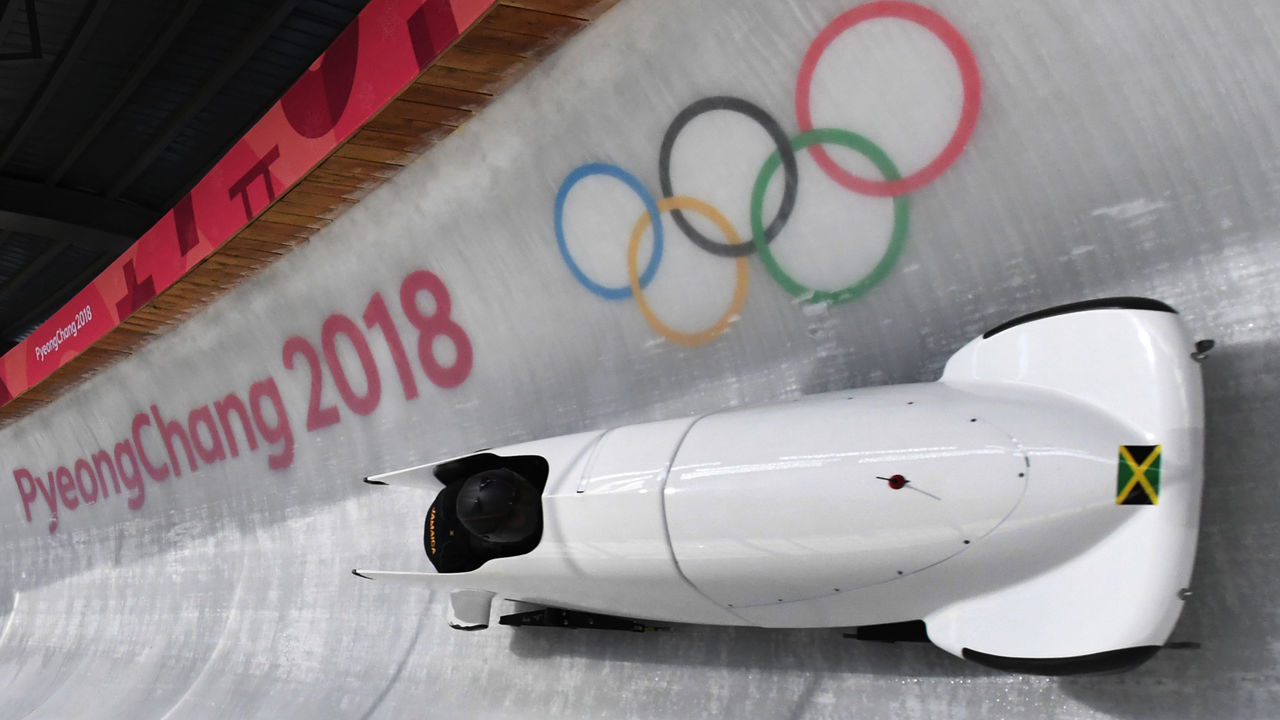 Team leader and driver Jazmine Fenlator-Victorian of Jamaica corners in the second women's unofficial bobsleigh training session at the Olympic Sliding Centre, ahead of the Pyeongchang 2018 Winter Olympic Games, in Pyeongchang on February 8, 2018. / AFP PHOTO / Mark Ralston