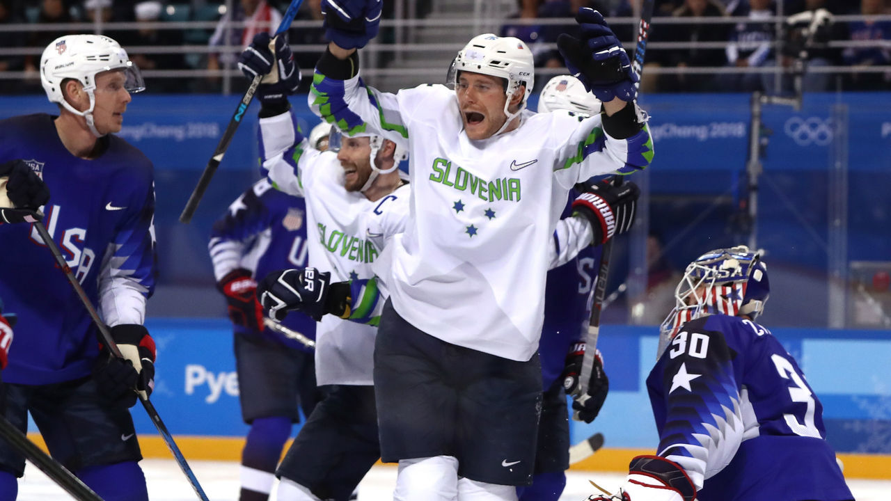 GANGNEUNG, SOUTH KOREA - FEBRUARY 14: Jan Urbas #26 of Slovenia celebrates a goal scored by Blaz Gregorc #15 against Ryan Zapolski #30 of the United States in the third period during the Men's Ice Hockey Preliminary Round Group B game on day five of the PyeongChang 2018 Winter Olympics at Kwandong Hockey Centre on February 14, 2018 in Gangneung, South Korea.