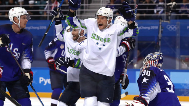 GANGNEUNG, SOUTH KOREA - FEBRUARY 14: Jan Urbas #26 of Slovenia celebrates a goal scored by Blaz Gregorc #15 against Ryan Zapolski #30 of the United States in the third period during the Men's Ice Hockey Preliminary Round Group B game on day five of the PyeongChang 2018 Winter Olympics at Kwandong Hockey Centre on February 14, 2018 in Gangneung, South Korea.