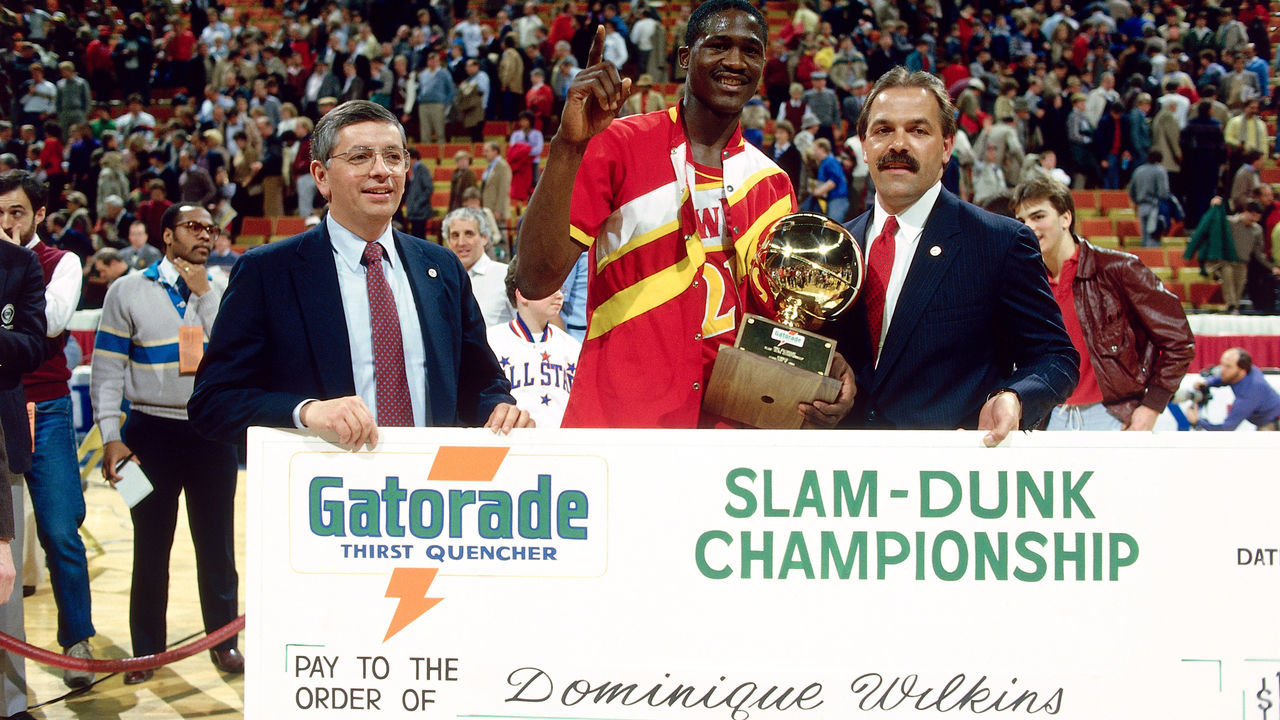 29 Jan. 1984: Doninique Wilkins #21 of the Atlanta Hawks poses with David Stern as he receives his check from the sponser of the Slam Dunk Contest during the NBA All Star Weekend in Denver, Colorado. NOTE TO USER: User expressly acknowledges and agrees that, by downloading and/or using this Photograph, User is consenting to the terms and conditions of the Getty Images License Agreement. Mandatory copyright notice and Credit: Copyright 2001 NBAE Mandatory Credit:Andrew D. Bernstein/NBAE/Getty Images