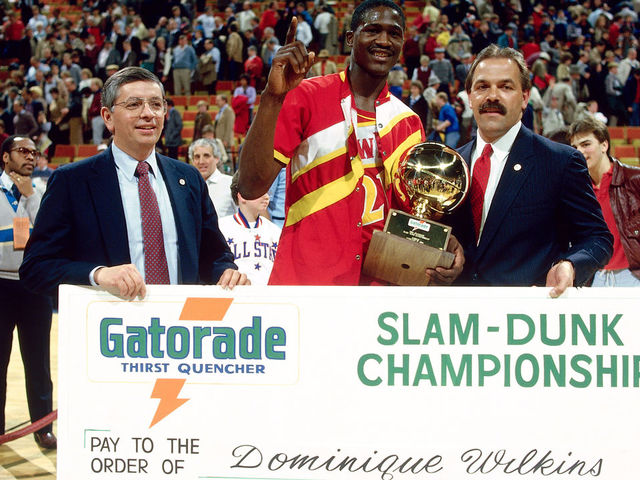 29 Jan. 1984: Doninique Wilkins #21 of the Atlanta Hawks poses with David Stern as he receives his check from the sponser of the Slam Dunk Contest during the NBA All Star Weekend in Denver, Colorado. NOTE TO USER: User expressly acknowledges and agrees that, by downloading and/or using this Photograph, User is consenting to the terms and conditions of the Getty Images License Agreement. Mandatory copyright notice and Credit: Copyright 2001 NBAE Mandatory Credit:Andrew D. Bernstein/NBAE/Getty Images