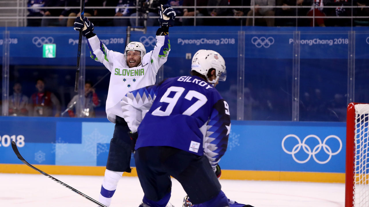 GANGNEUNG, SOUTH KOREA - FEBRUARY 14: Jan Mursak #39 of Slovenia celebrates after scoring the game winning goal against Ryan Zapolski #30 of the United States in overtime of the Men's Ice Hockey Preliminary Round Group B game on day five of the PyeongChang 2018 Winter Olympics at Kwandong Hockey Centre on February 14, 2018 in Gangneung, South Korea.