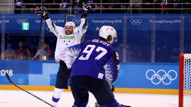GANGNEUNG, SOUTH KOREA - FEBRUARY 14: Jan Mursak #39 of Slovenia celebrates after scoring the game winning goal against Ryan Zapolski #30 of the United States in overtime of the Men's Ice Hockey Preliminary Round Group B game on day five of the PyeongChang 2018 Winter Olympics at Kwandong Hockey Centre on February 14, 2018 in Gangneung, South Korea.