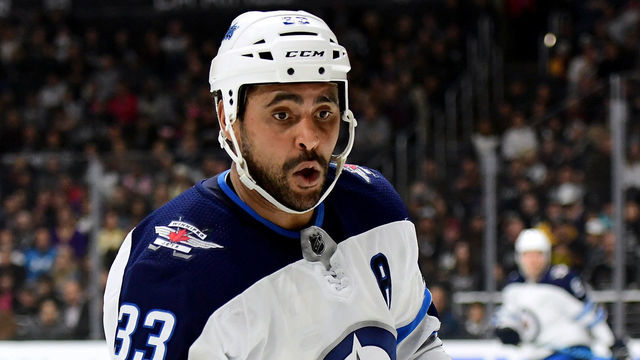 LOS ANGELES, CA - NOVEMBER 22: Dustin Byfuglien #33 of the Winnipeg Jets skates after te puck during the game against the Los Angeles Kings at Staples Center on November 22, 2017 in Los Angeles, California.
