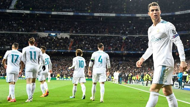 Real Madrid's Portuguese forward Cristiano Ronaldo walks on the pitch during the UEFA Champions League round of sixteen first leg football match Real Madrid CF against Paris Saint-Germain (PSG) at the Santiago Bernabeu stadium in Madrid on February 14, 2018. / AFP PHOTO / GABRIEL BOUYS