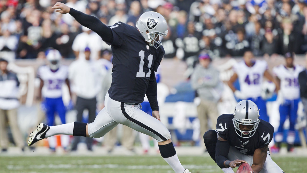 OAKLAND, CA - DECEMBER 4: Kicker Sebastian Janikowski #11 of the Oakland Raiders scores a point after touchdown against the Buffalo Bills on December 4, 2016 at Oakland-Alameda County Coliseum in Oakland, California. The Raiders won 38-24.