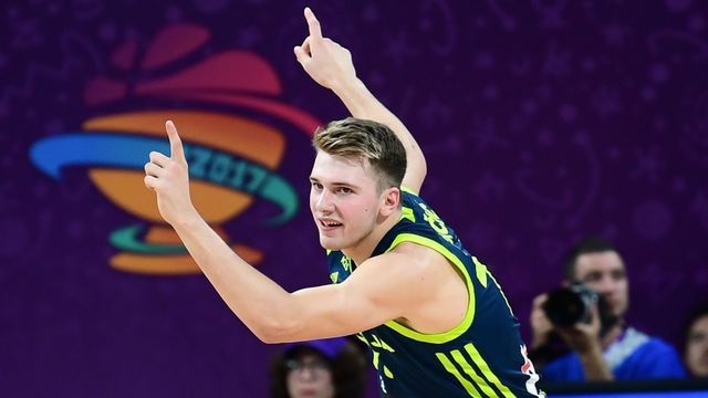 Slovenia's guard Luka Doncic reacts after scoring a basket during the FIBA Eurobasket 2017 men's semi-final basketball match between Spain and Slovenia at the Fenerbahce Ulker Sport Arena in Istanbul on September 14, 2017. / AFP PHOTO / OZAN KOSE