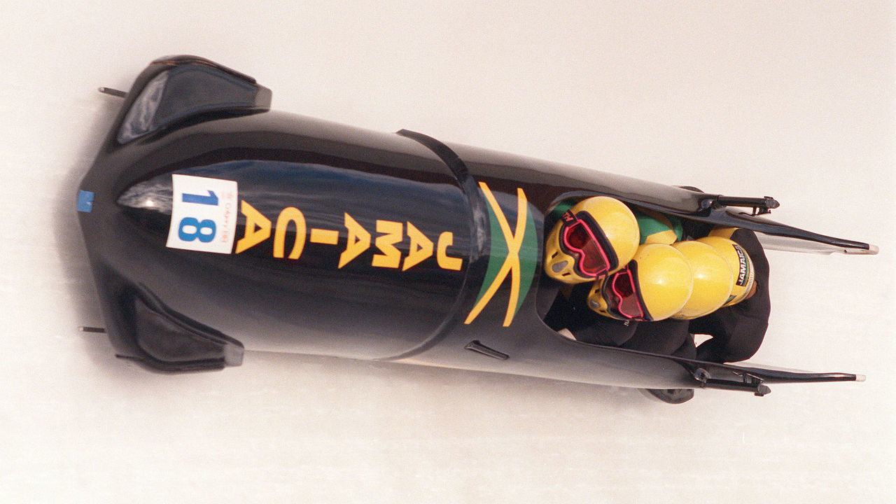 The Jamaican 4-man bobsled speeds down the track during the first run of the men's competition 27 February 1988 at the Calgary Winter Olympic Games. AFP PHOTO/MARK CARDWELL