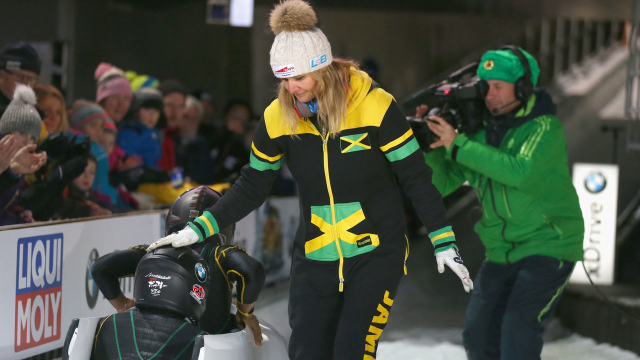 KOENIGSSEE, GERMANY - JANUARY 20: Sandra Kiriasis (C), head coach of team Jamaica reacts with her athletes Jazmine Fenlator-Victorian and Carrie Russell of Jamaica at Deutsche Post Eisarena Koenigssee after the BMW IBSF World Cup Women`s Bobsleigh World Cup on January 19, 2018 in Koenigssee, Germany.