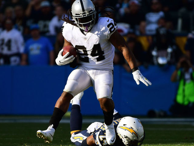 CARSON, CA - DECEMBER 31: Marshawn Lynch #24 of the Oakland Raiders breaks free from Trevor Williams #24 of the Los Angeles Chargers during the second quarter of the game at StubHub Center on December 31, 2017 in Carson, California.