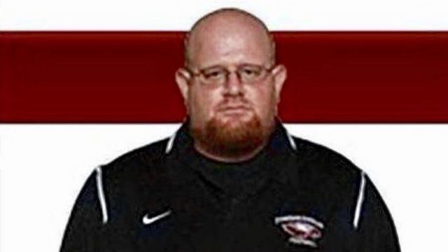 Report: Football coach shielded students from bullets in Florida shooting